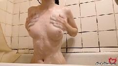 Sexy babe passionate play pussy and washes in the shower